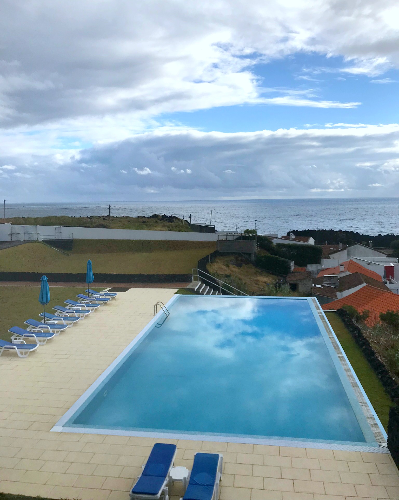 view from lanai overlooking the infinity pool and the Azores