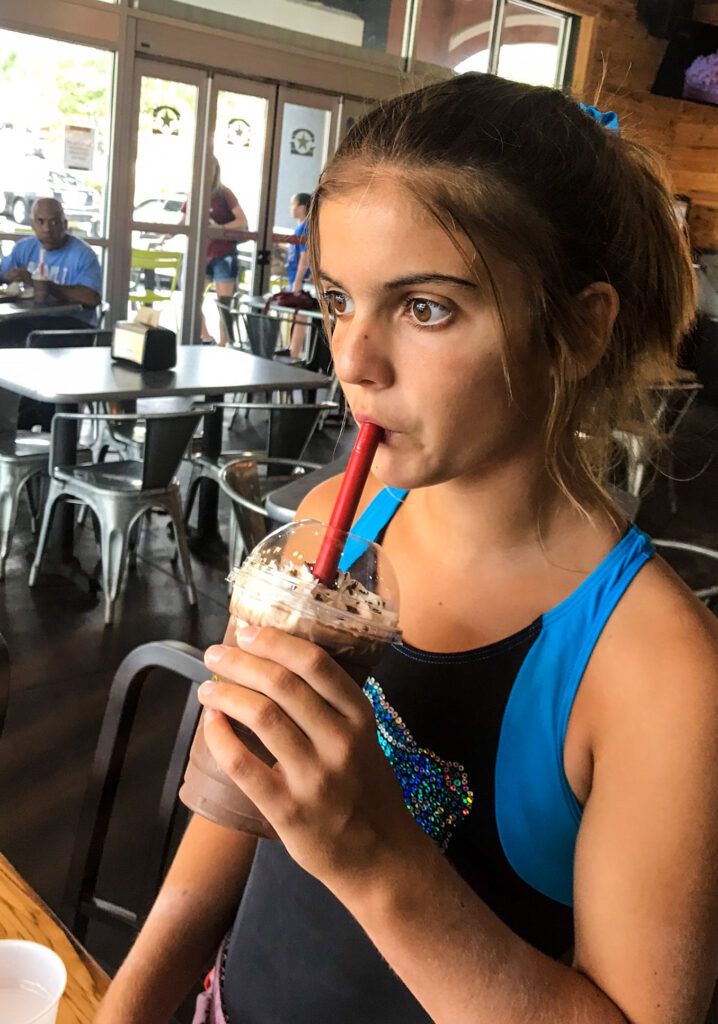 gymnast drinking milkshake Burger Fi Gainsville Florida 